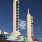 Futuristic spaceport with golden spacecraft and ornate buildings under starlit sky