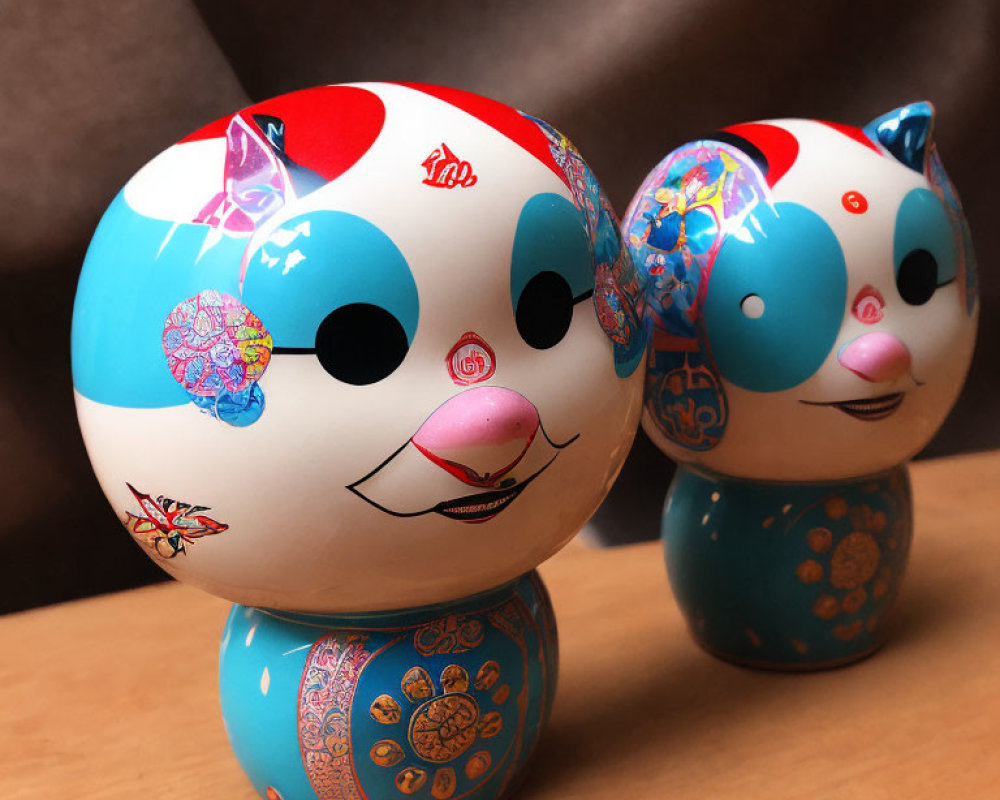 Japanese Kokeshi Dolls with Floral Patterns and Red Accents on Brown Background