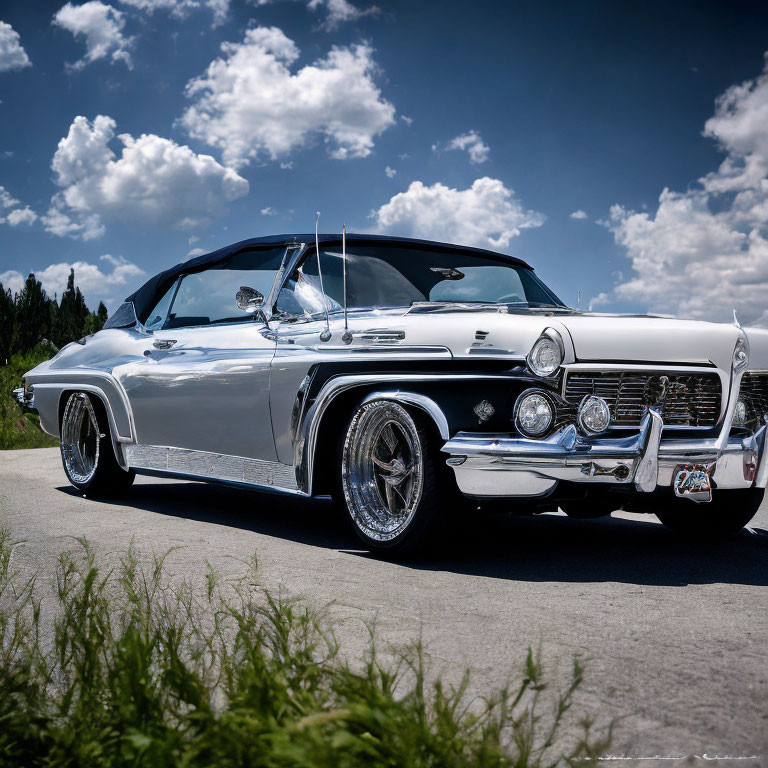 White Convertible Car with Chrome Details Under Blue Sky