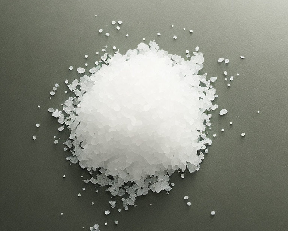 White Sea Salt Pile on Dark Grey Background