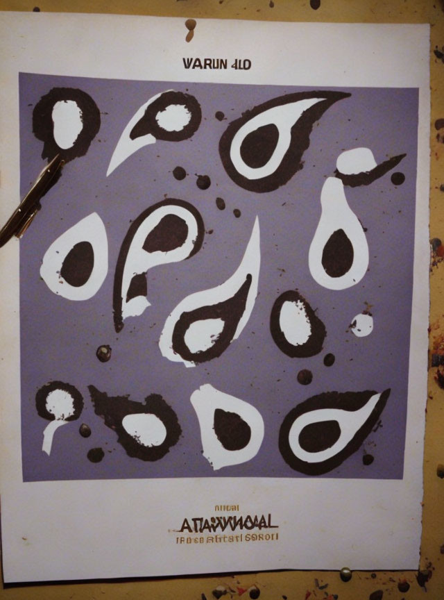 Abstract black and white painting with blob shapes and splatters, featuring text elements.