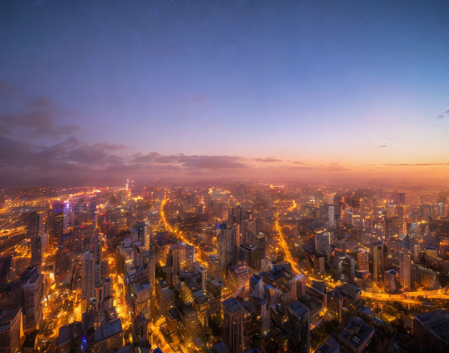 Cityscape with illuminated buildings under starry sky at twilight.