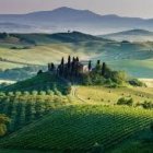 Colorful Castle on Hill with Rolling Hills and Clear Sky