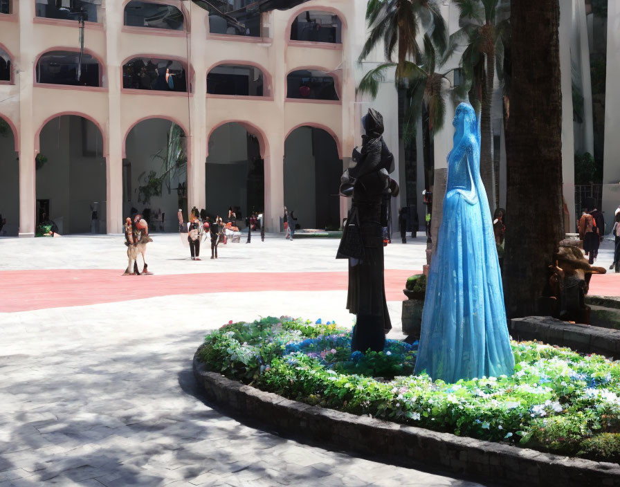 Sunny courtyard with arched corridors, blue and black statues, and garden beds