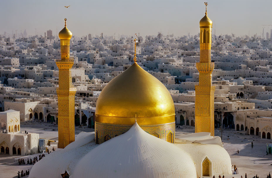 Golden-domed mosque and minarets in dense cityscape.