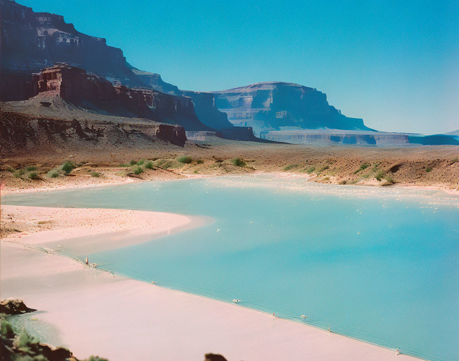 Turquoise River in Canyon with Layered Rock Formations