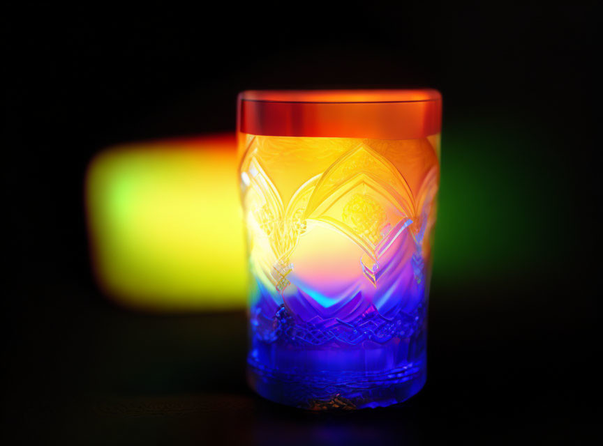 Iridescent glass with intricate patterns on dark background with soft multicolored lights