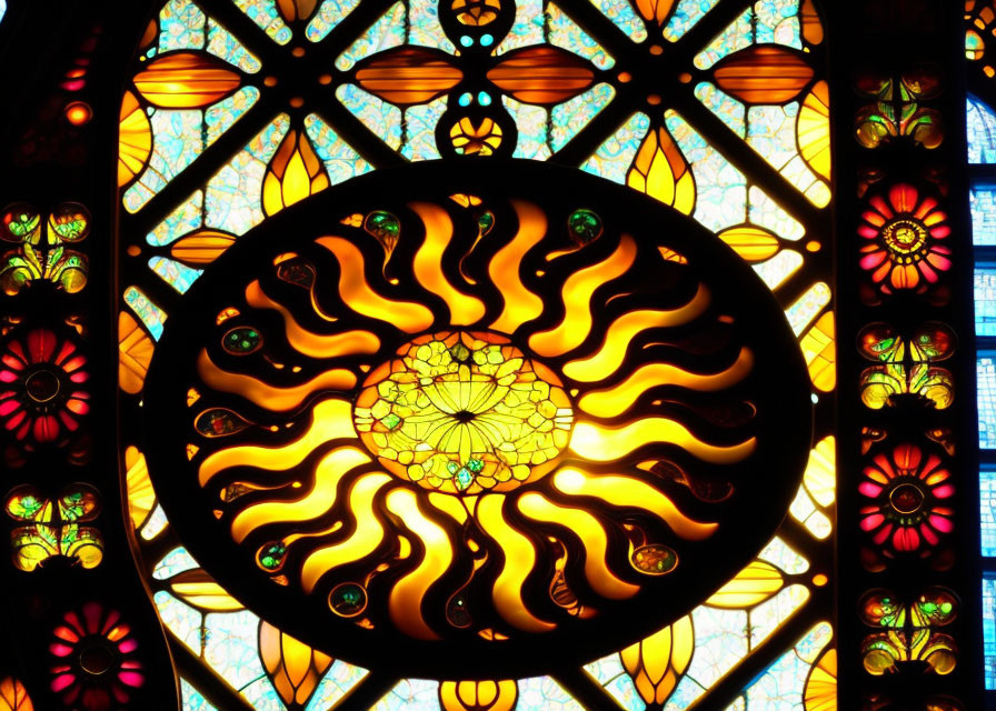 Colorful swirling pattern stained glass window with warm hues