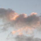 Surreal castle on cloud with tower and birds in sky