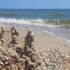 Tower-like Rock Formations Amid Blurred Seascape