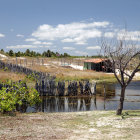 Tranquil Lake Scene with Floating Gardens and Traditional Pavilions