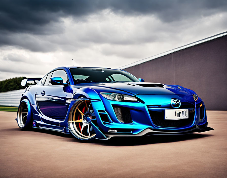 Customized Blue Mazda RX-8 with Wide Body Kit and Custom Rims