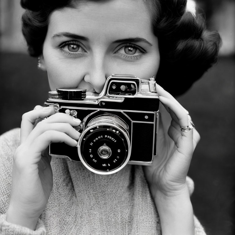 Vintage Style Woman Peering Through Classic Camera