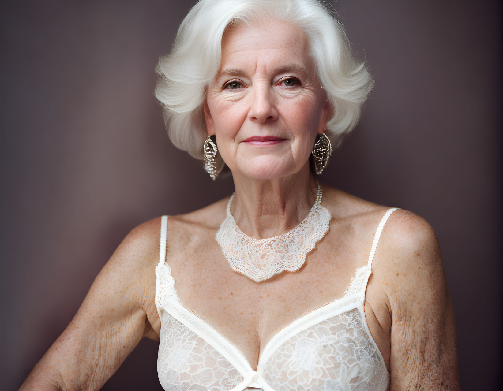 White-Haired Elderly Woman in Lace Attire on Mauve Background