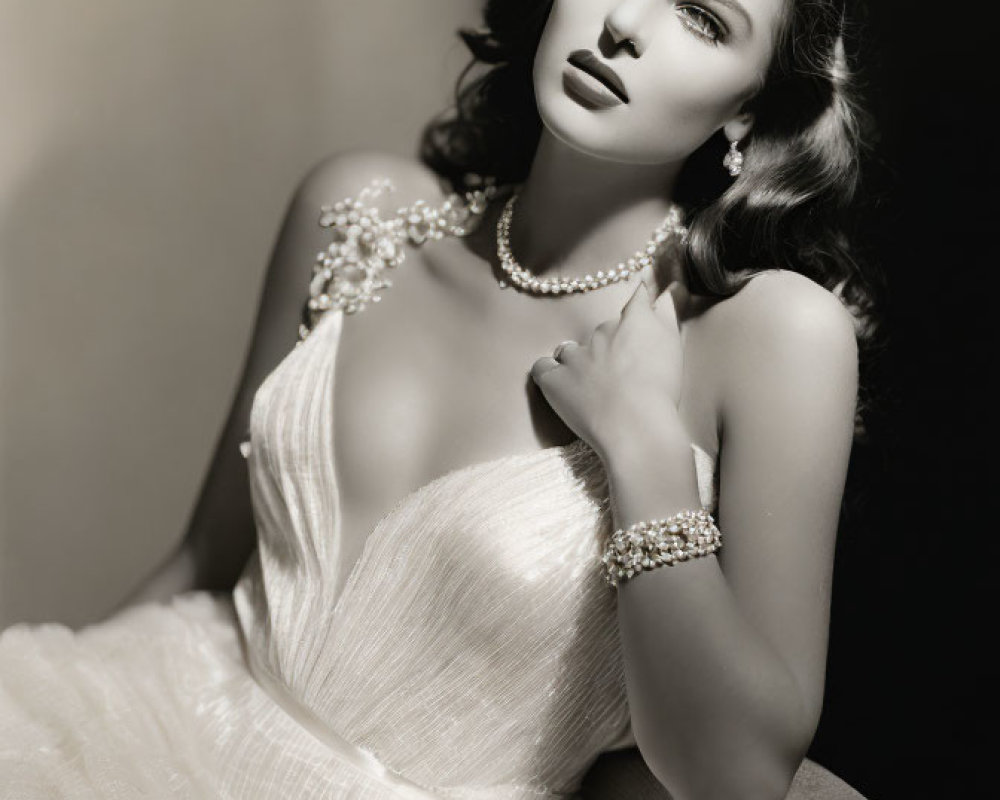 Monochrome image of woman in Hollywood glamour with jewelry