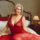 Elegant person with white hair in red lace dress on bed in warm-lit room