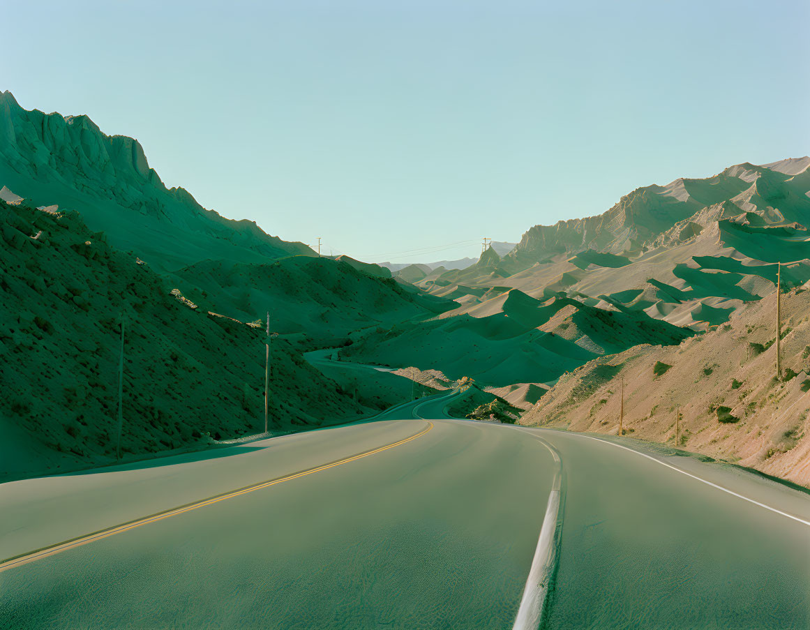 Curving Road in Tranquil Desert Landscape