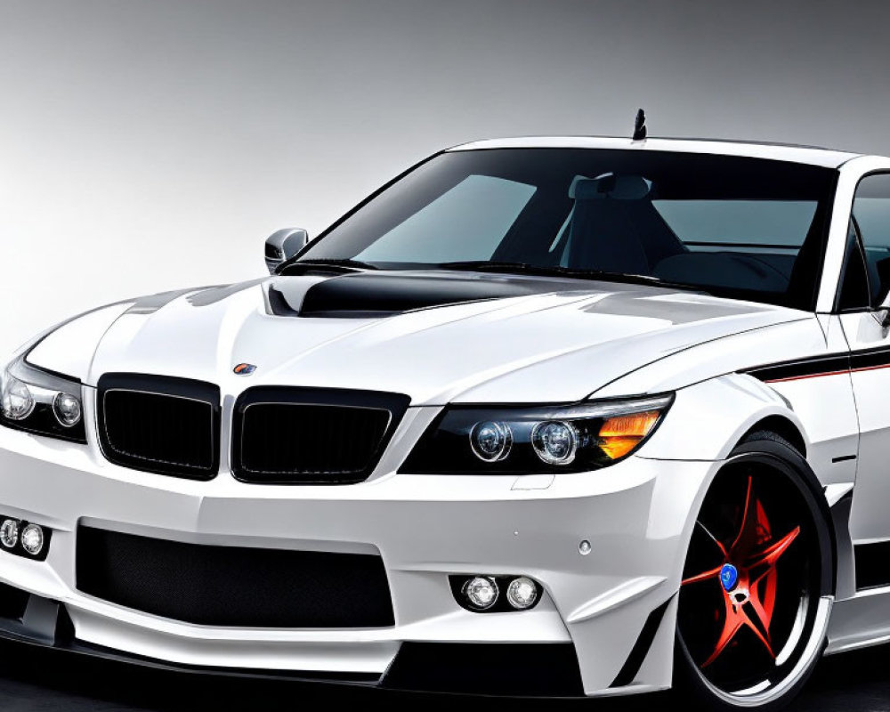 Sporty White BMW with Black and Red Custom Rims and Aggressive Body Kit