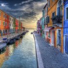 Colorful Canal Painting with Houses, Boat, and Evening Sky