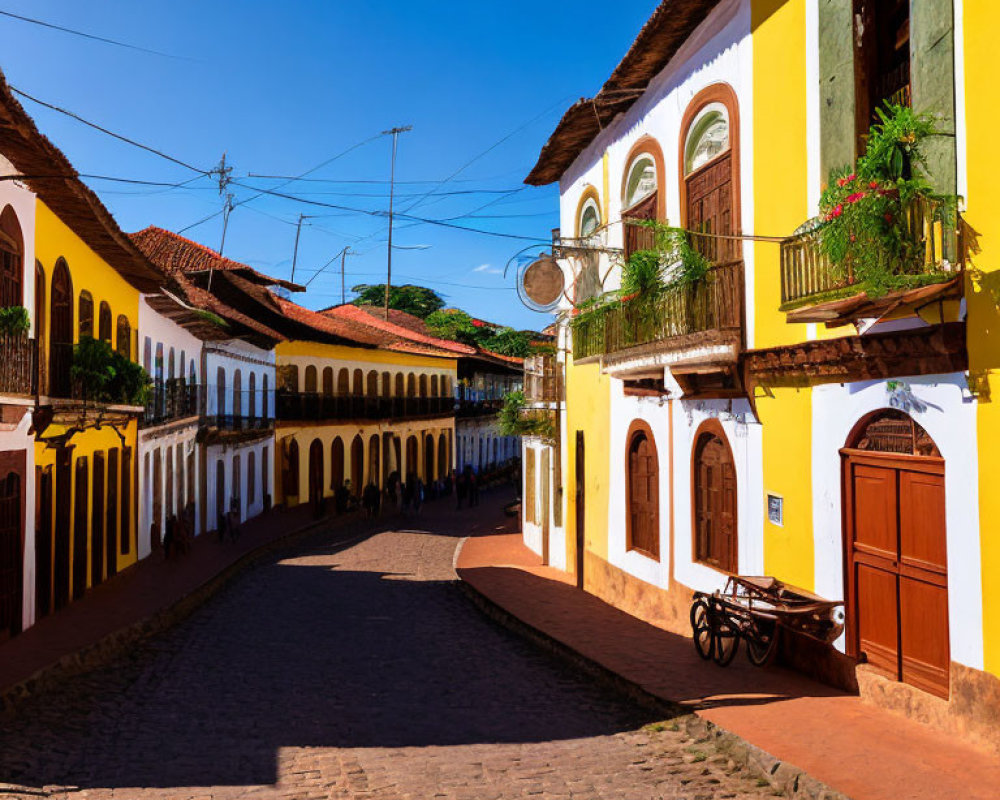 Colonial-style Buildings on Cobblestone Street in Traditional Town