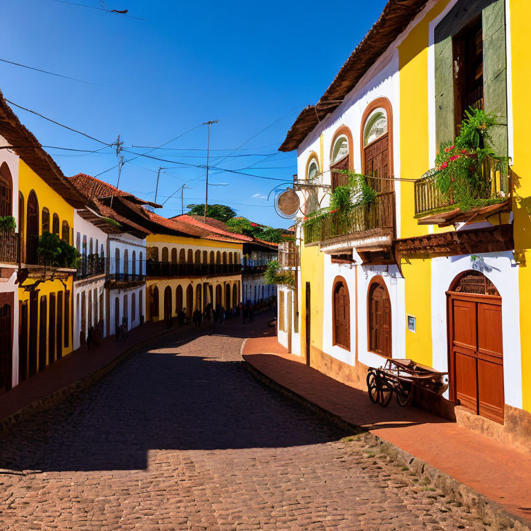 Colonial-style Buildings on Cobblestone Street in Traditional Town