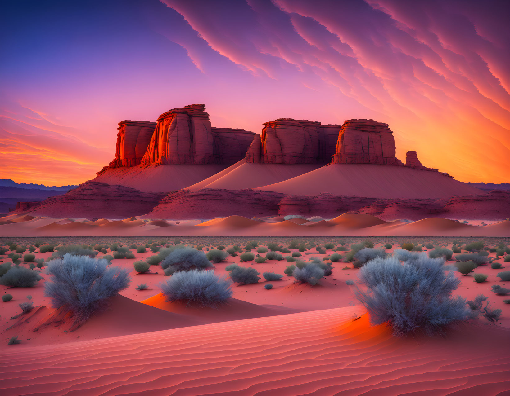 Desert landscape at sunset with sandstone buttes, sand dunes, shrubs, and vivid