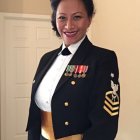 Detailed Military Uniform Woman with Medals and Golden Epaulettes