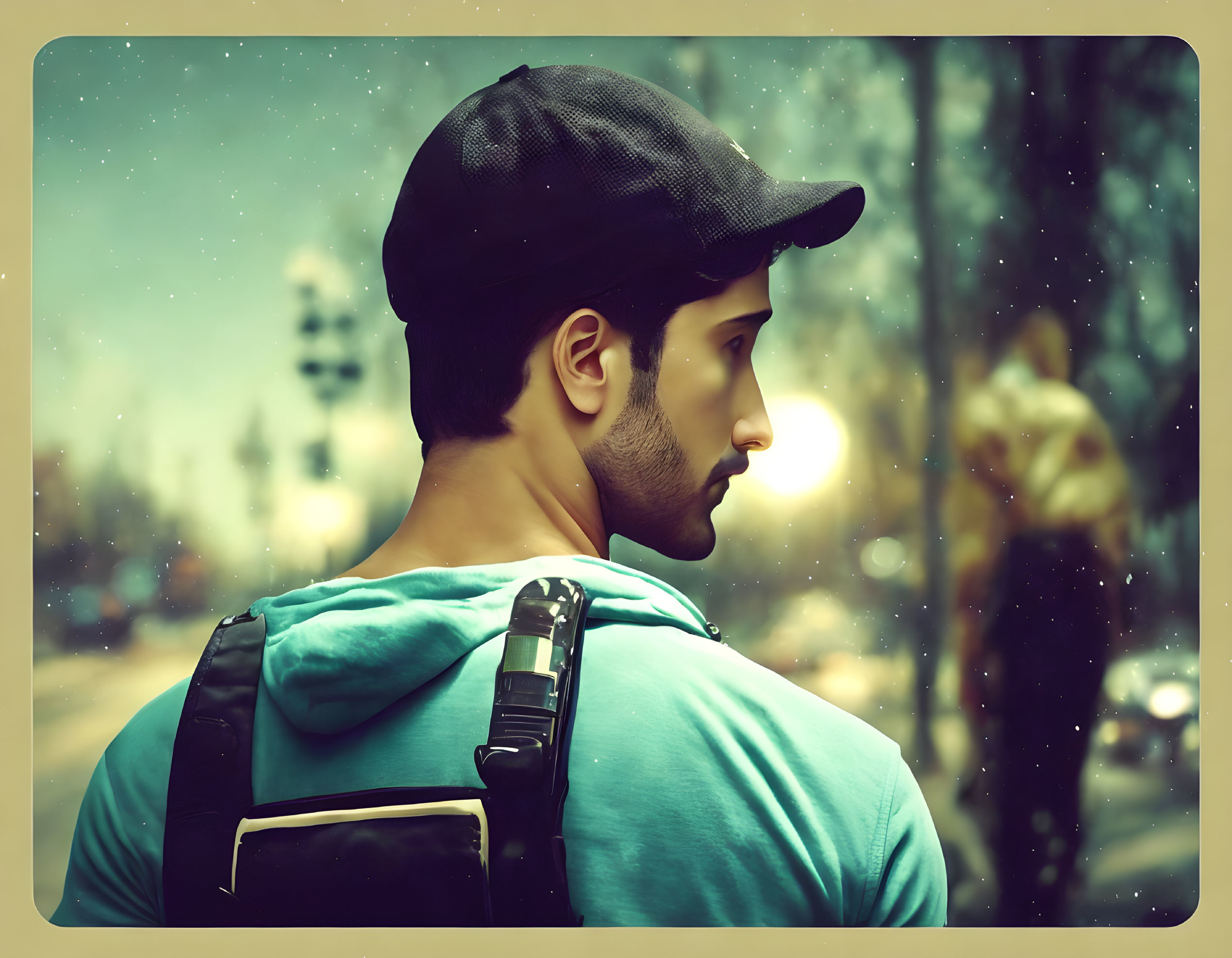 Person in cap and backpack with blurred street scene and glowing lights