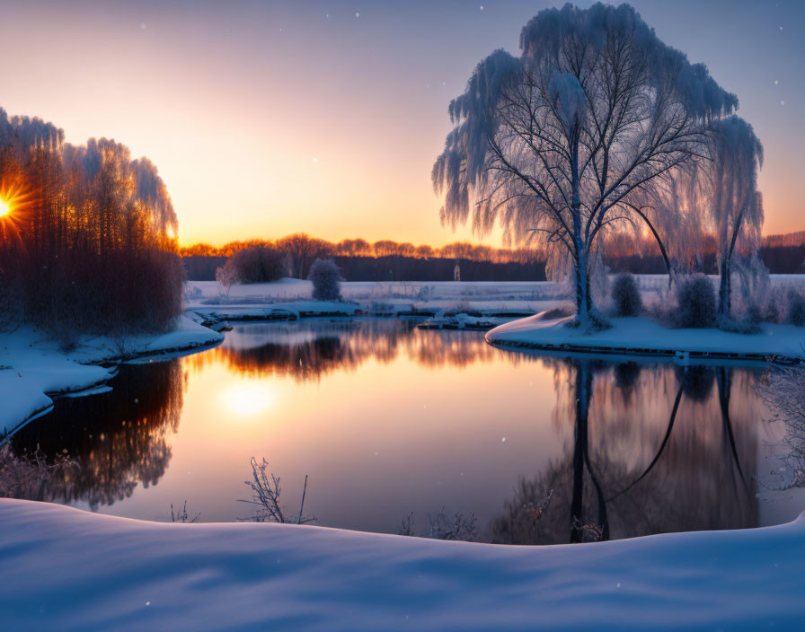 Snow-covered landscape at sunset with reflective river, frosty trees, vibrant sky