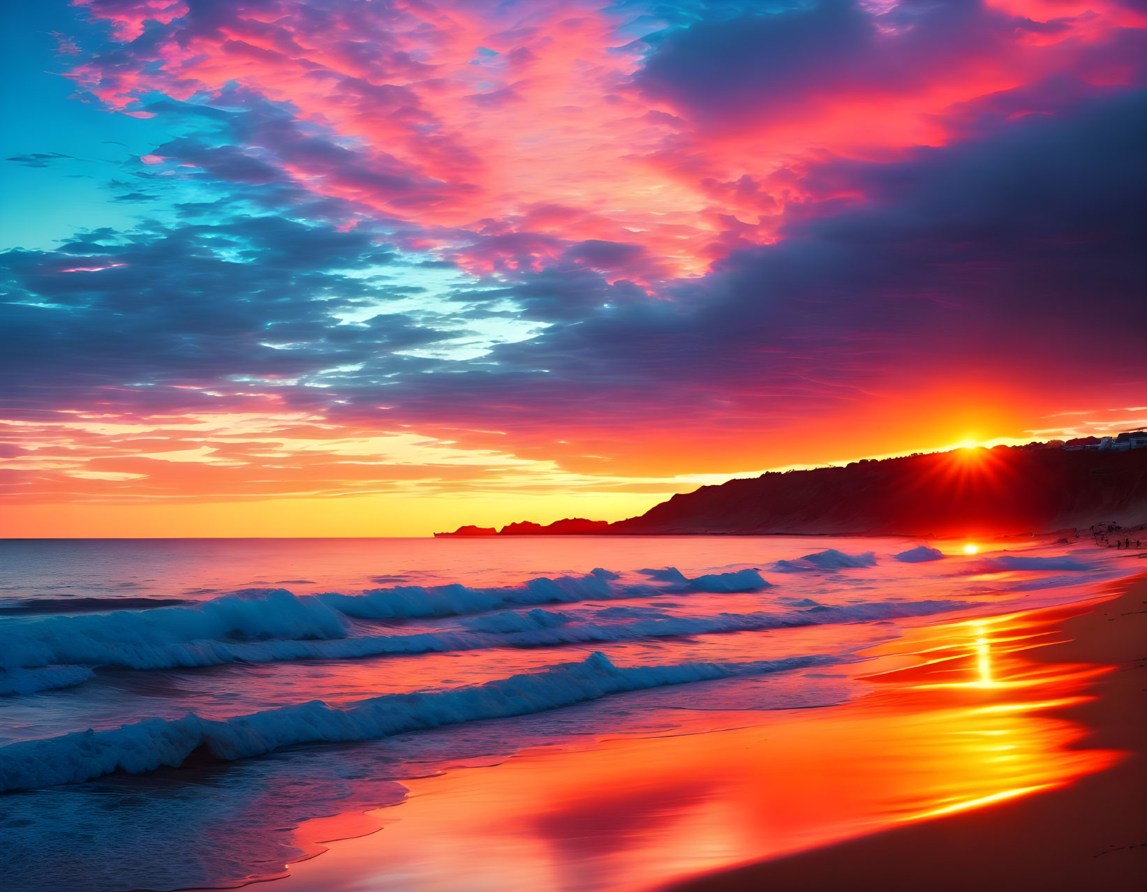 Scenic beach sunset with pink and blue skies over wet sand