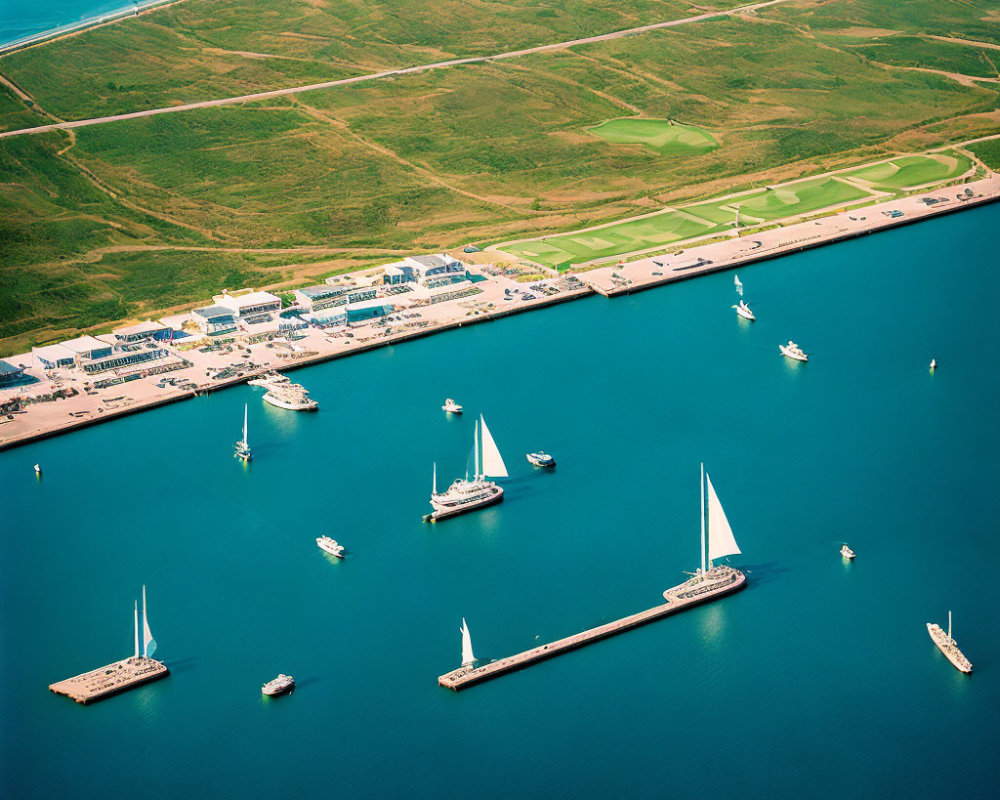 Coastal Marina with Docks and Moored Yachts in Clear Blue Water