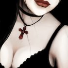 Close-up of woman in red lipstick and silver necklace on dark background