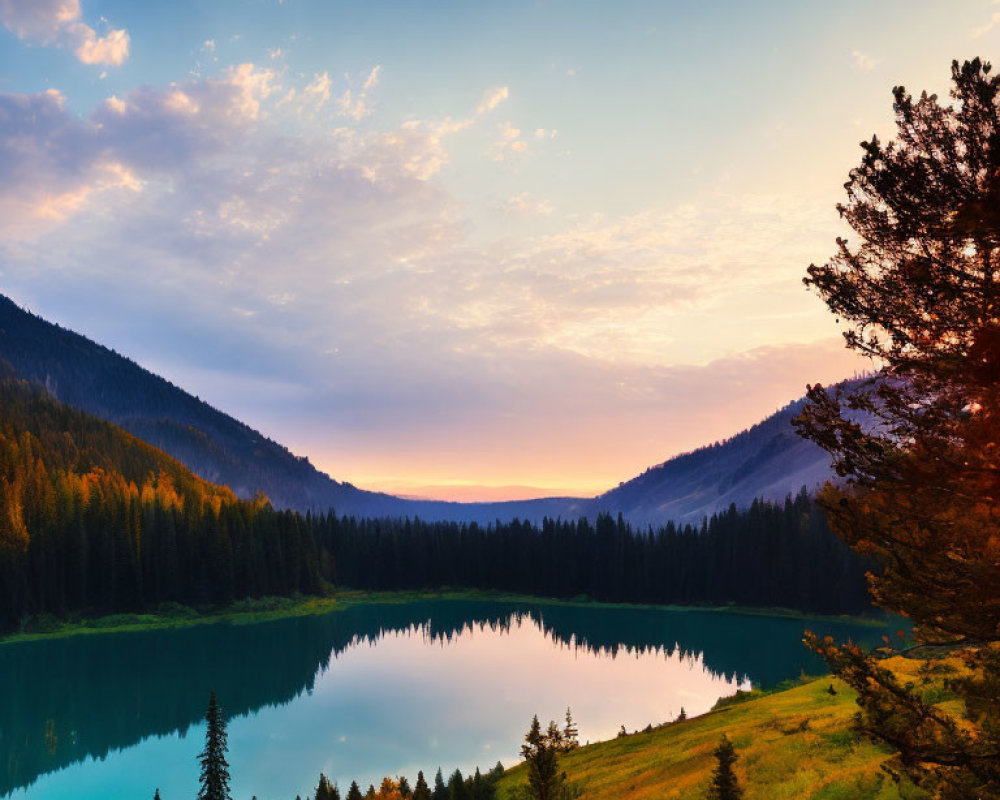 Vibrant sunset sky reflected in serene mountain lake