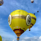 Vibrant hot air balloons in blue sky at dawn