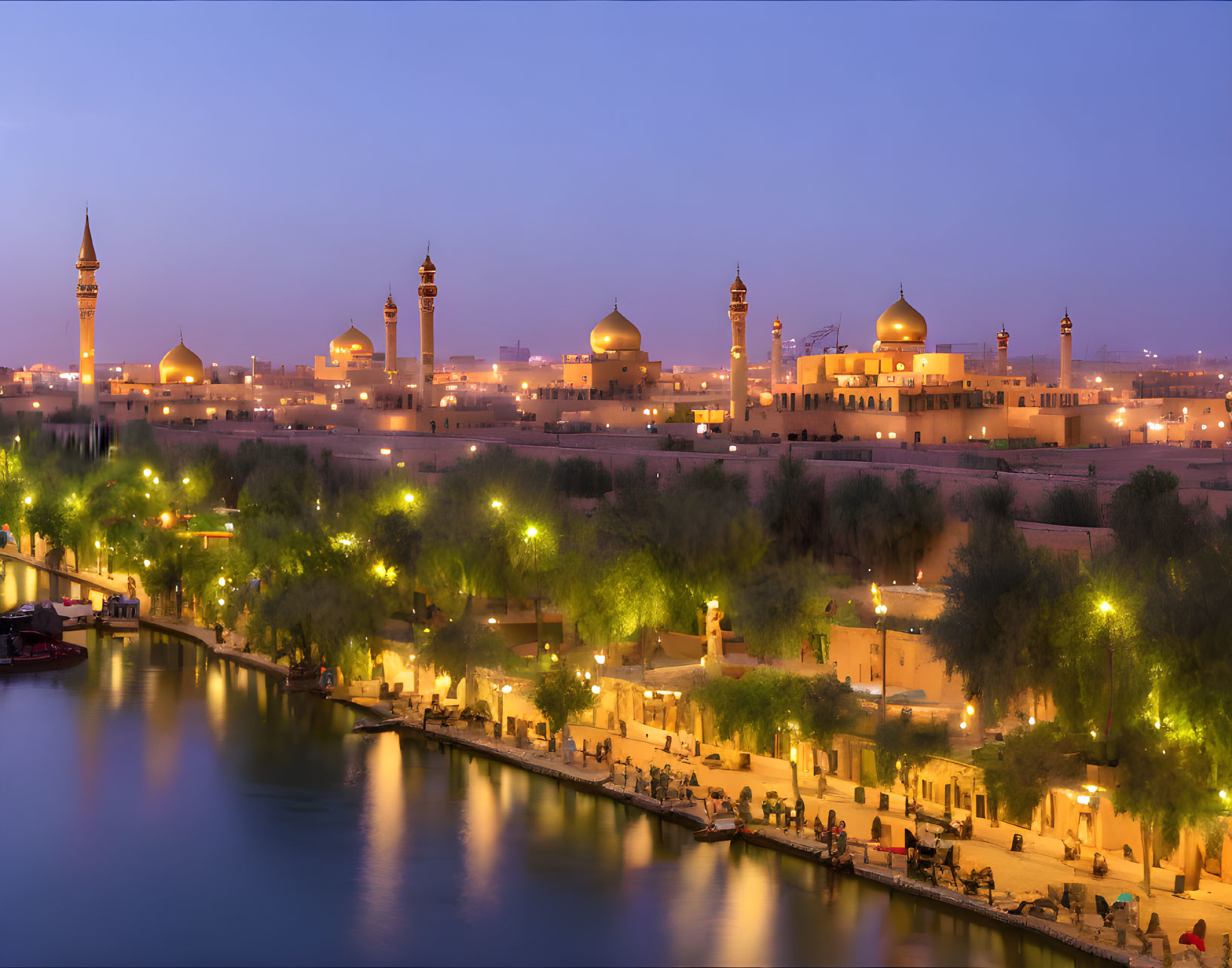 Tranquil River at Dusk with Lit Mosques and Prominent Domes