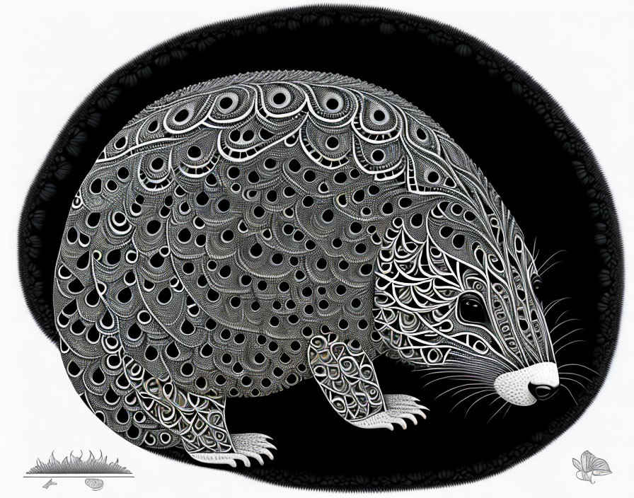 Detailed black and white armadillo illustration with decorative motifs on shell.