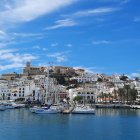 Coastal Town Digital Artwork: Pink & White Buildings, Twin Moons