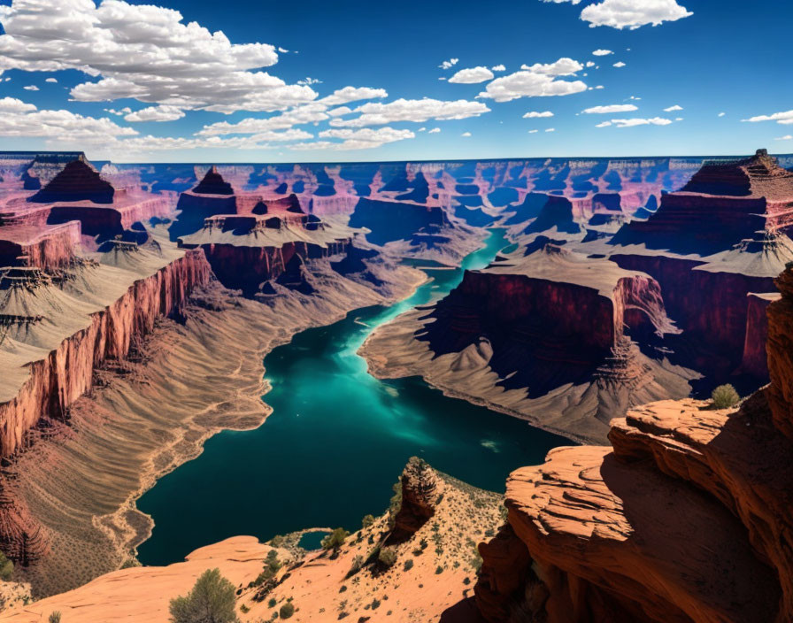 Grand Canyon Panoramic View with Winding River and Clear Blue Sky