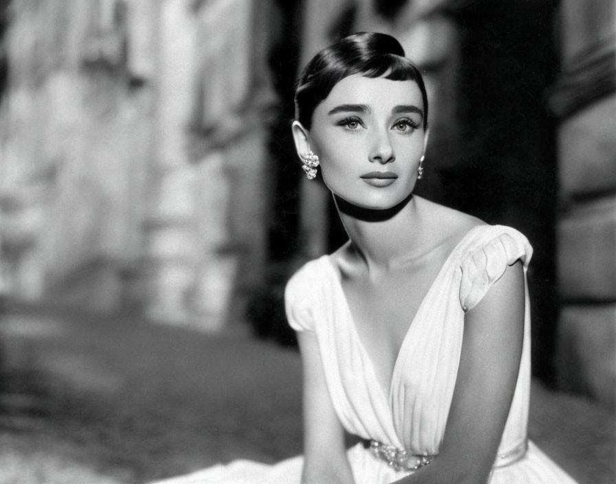 Classic Hollywood Look: Elegant Woman in White Dress with Prominent Earring