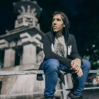 Stylized CG characters resembling teenagers in trendy outfits hanging out