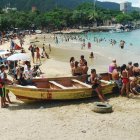 Whimsical Beach Scene with Fanciful Structures and Boats