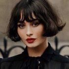 Woman with Short Curly Hair, Floral Adornments, Glasses, Black Blouse, and Red