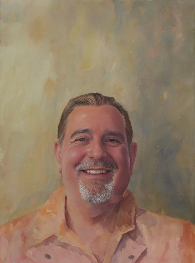 Smiling man with short gray beard in peach shirt on textured beige background