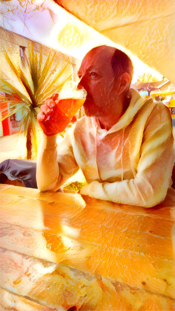 guy with beer at table