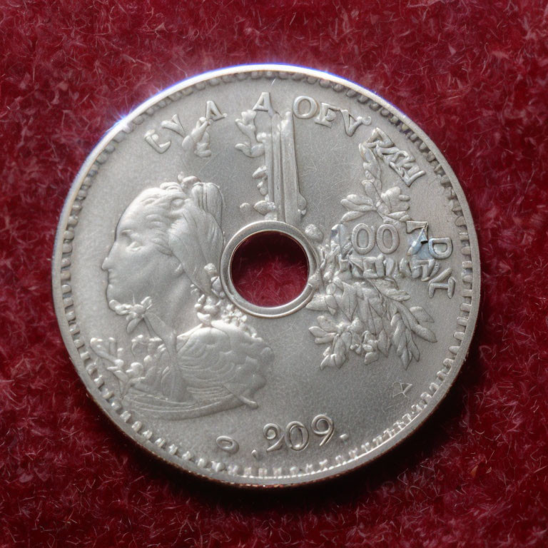 Silver Coin with Profile Portrait of Woman and Floral Motifs on Red Background