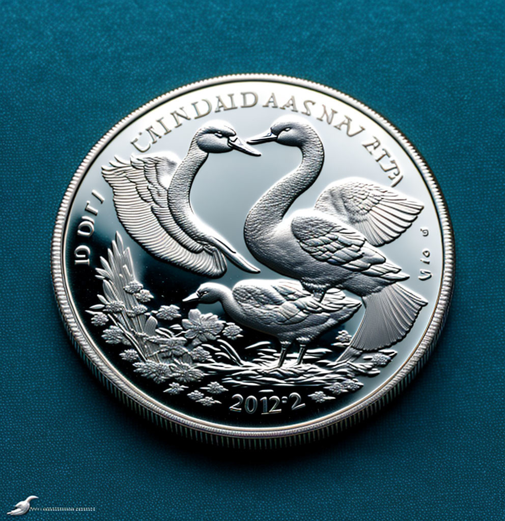 2012 Coin with Two Swans Flying Over Water on Blue Background