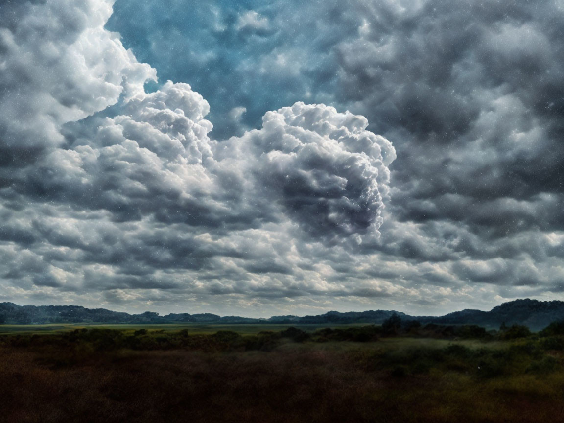 Dramatic Sky Over Serene Landscape and Fields