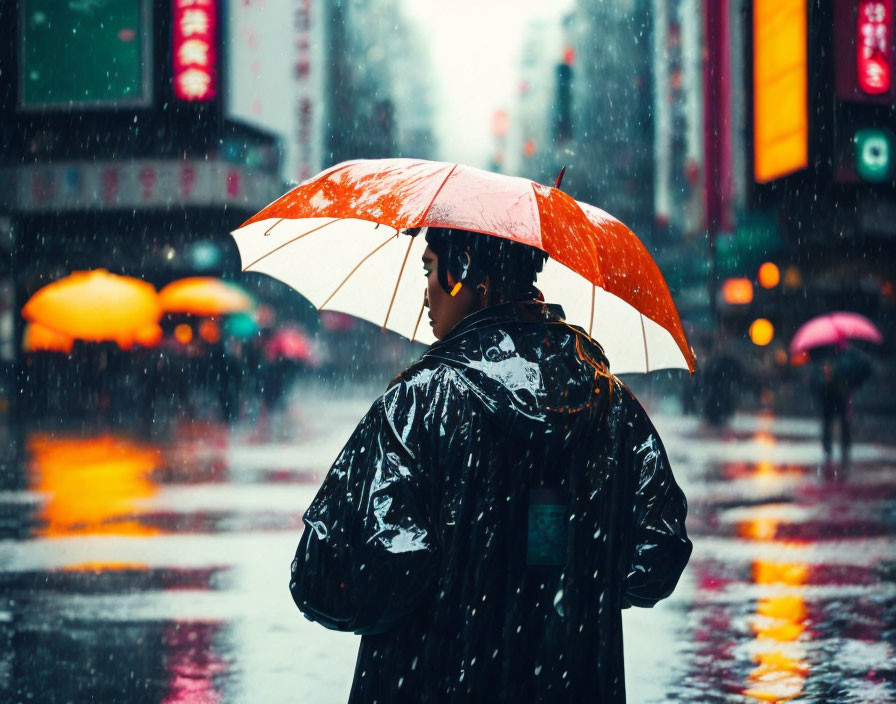 Person standing in rain with red and white umbrella on busy city street with neon signs and umbrellas.