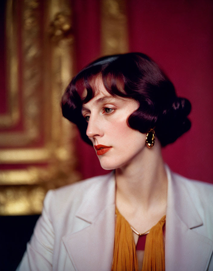 Woman with Dark Bobbed Hair in White Blazer and Red Lipstick