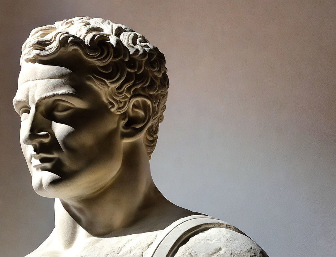 Detailed Classical Marble Bust of Man's Face with Curly Hair